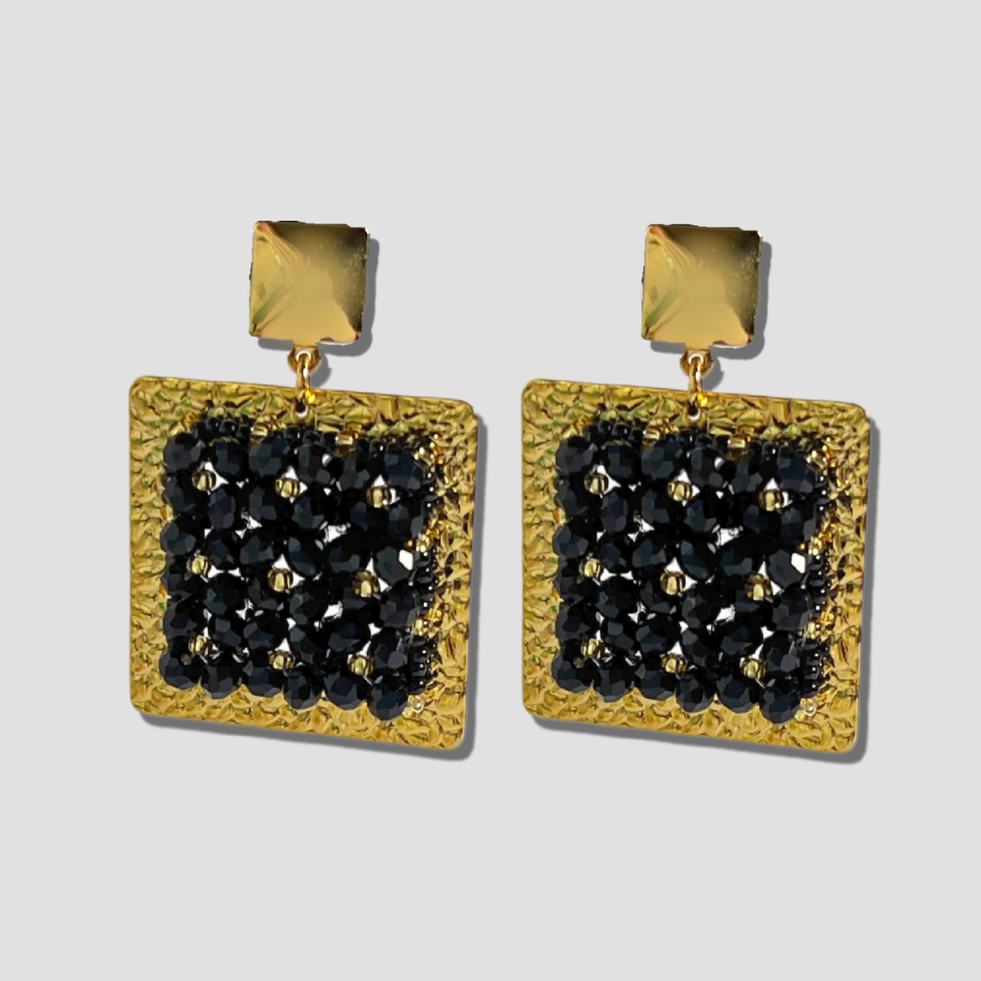 Juego de aretes y brazalete ancho negro