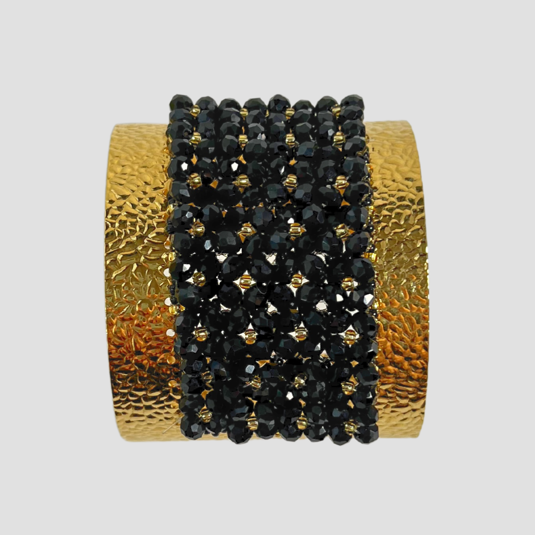 Juego de aretes y brazalete ancho negro