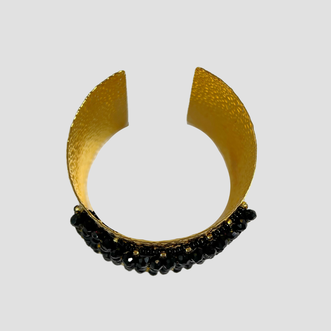 Juego de aretes y brazalete ancho negro