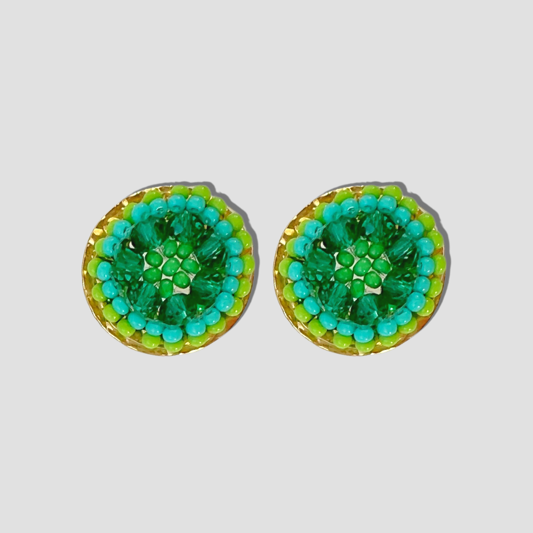 Juego de aretes y brazalete ancho con flor verde