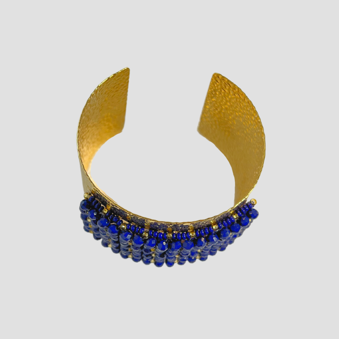 Juego de aretes y brazalete ancho azul